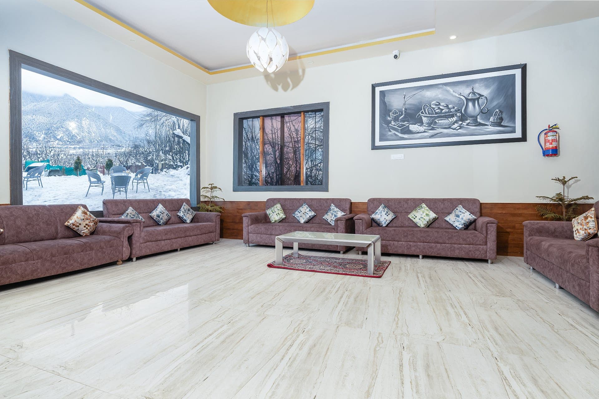 Hotel Sparrow lobby lounge seating with a garden view