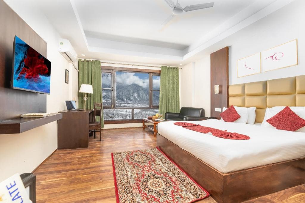 Family interconnected room at Hotel Sparrow with two king beds and mountain view
