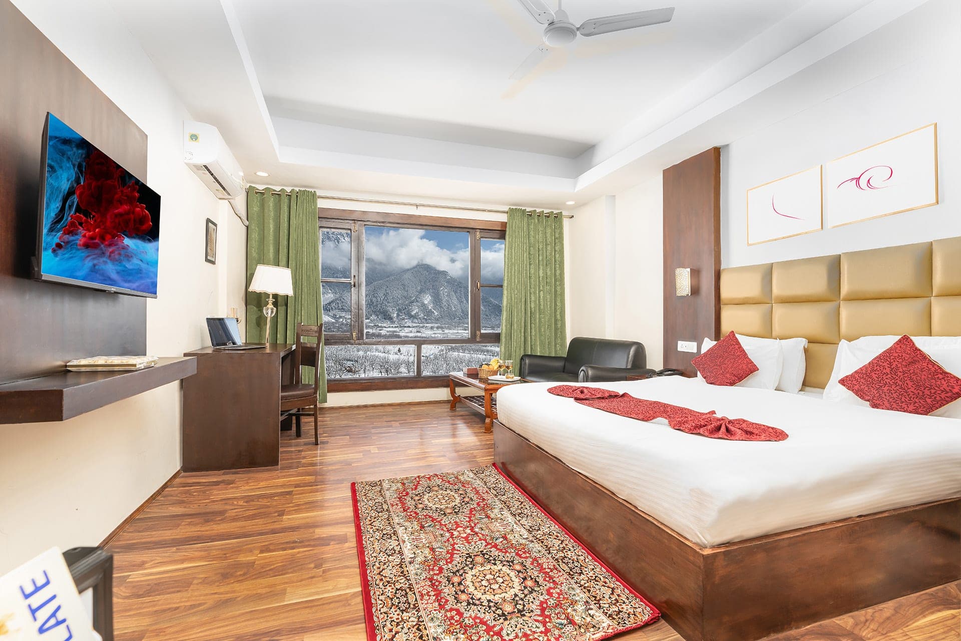 Superior room at Hotel Sparrow with a king bed facing panoramic Himalayan mountain views